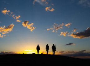 A few photography workshop clients at sunset exploring grasslands national park saskatchewan